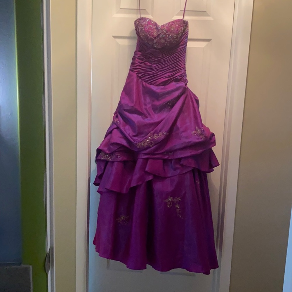 Shimmery purple strapless prom type dress.